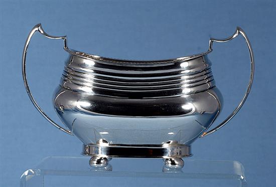 A 1940s silver three piece tea set, by William Bush & Sons, teapot height 156mm, gross weight 41.2oz/1283grms